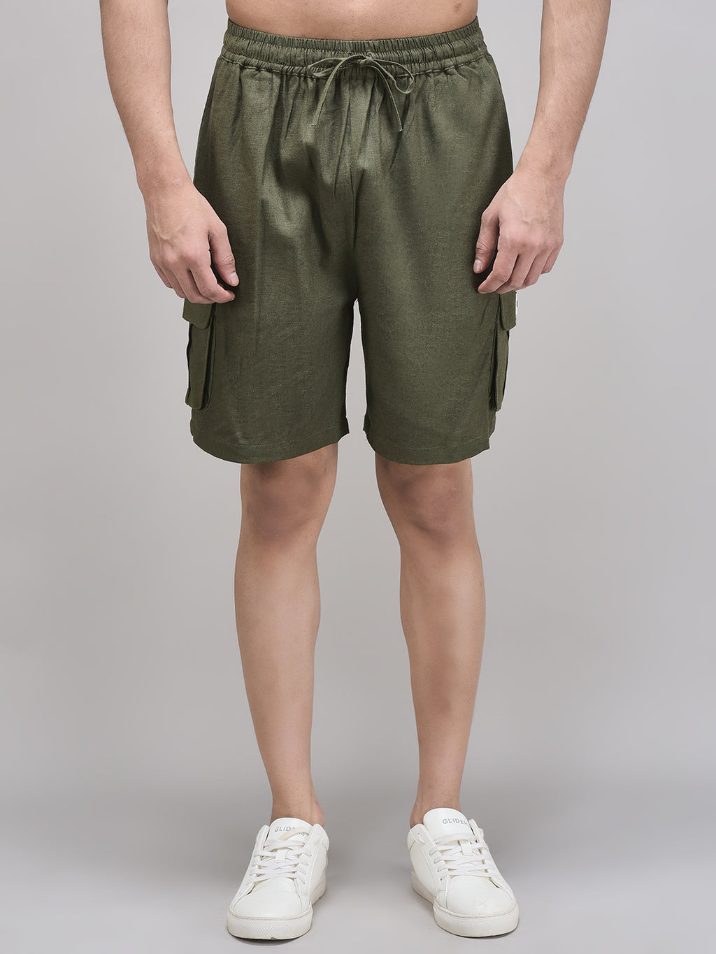 Front view of men’s olive linen cargo shorts
