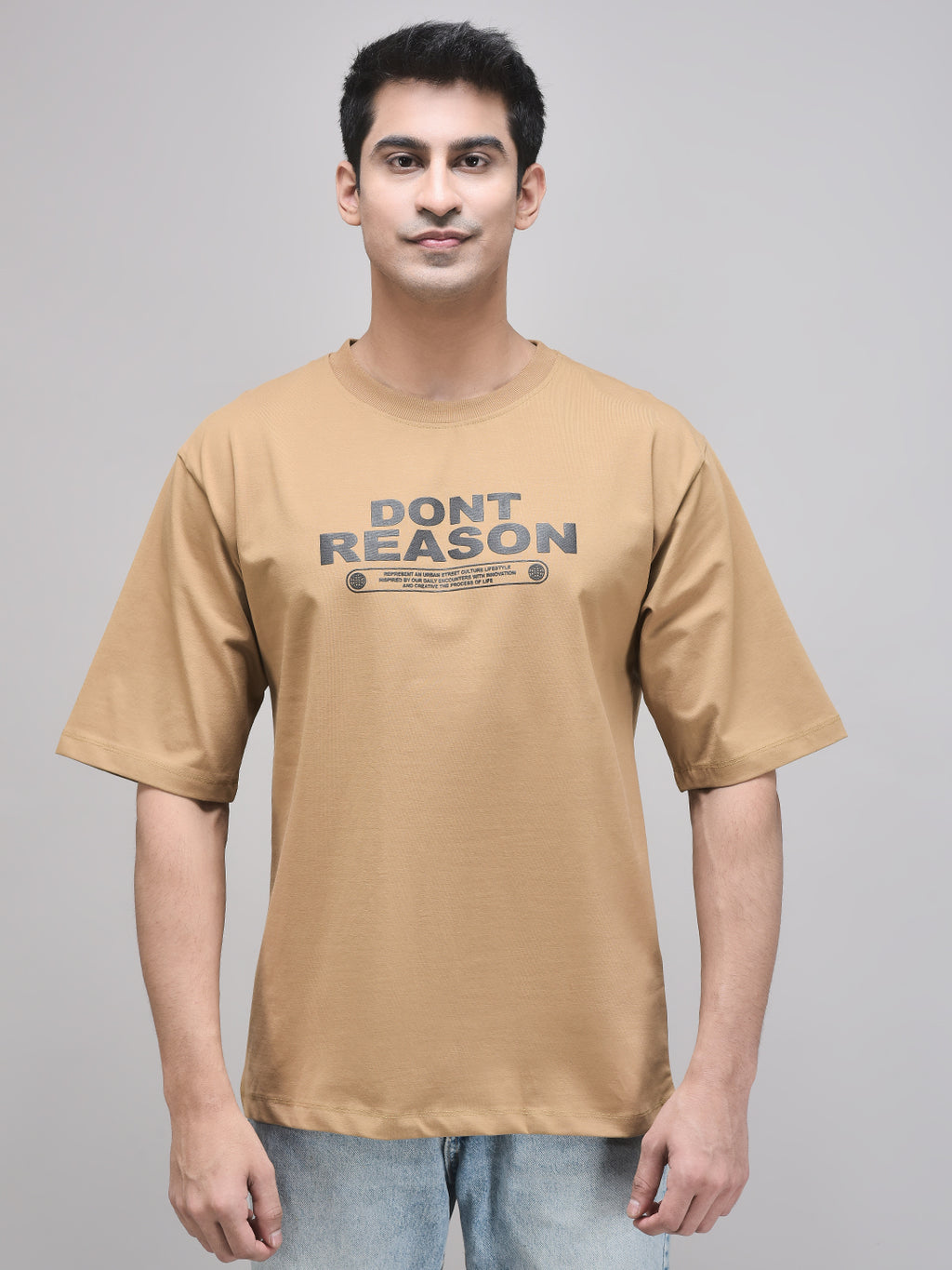 Unisex brown oversized cotton t-shirt with graphic print – front view