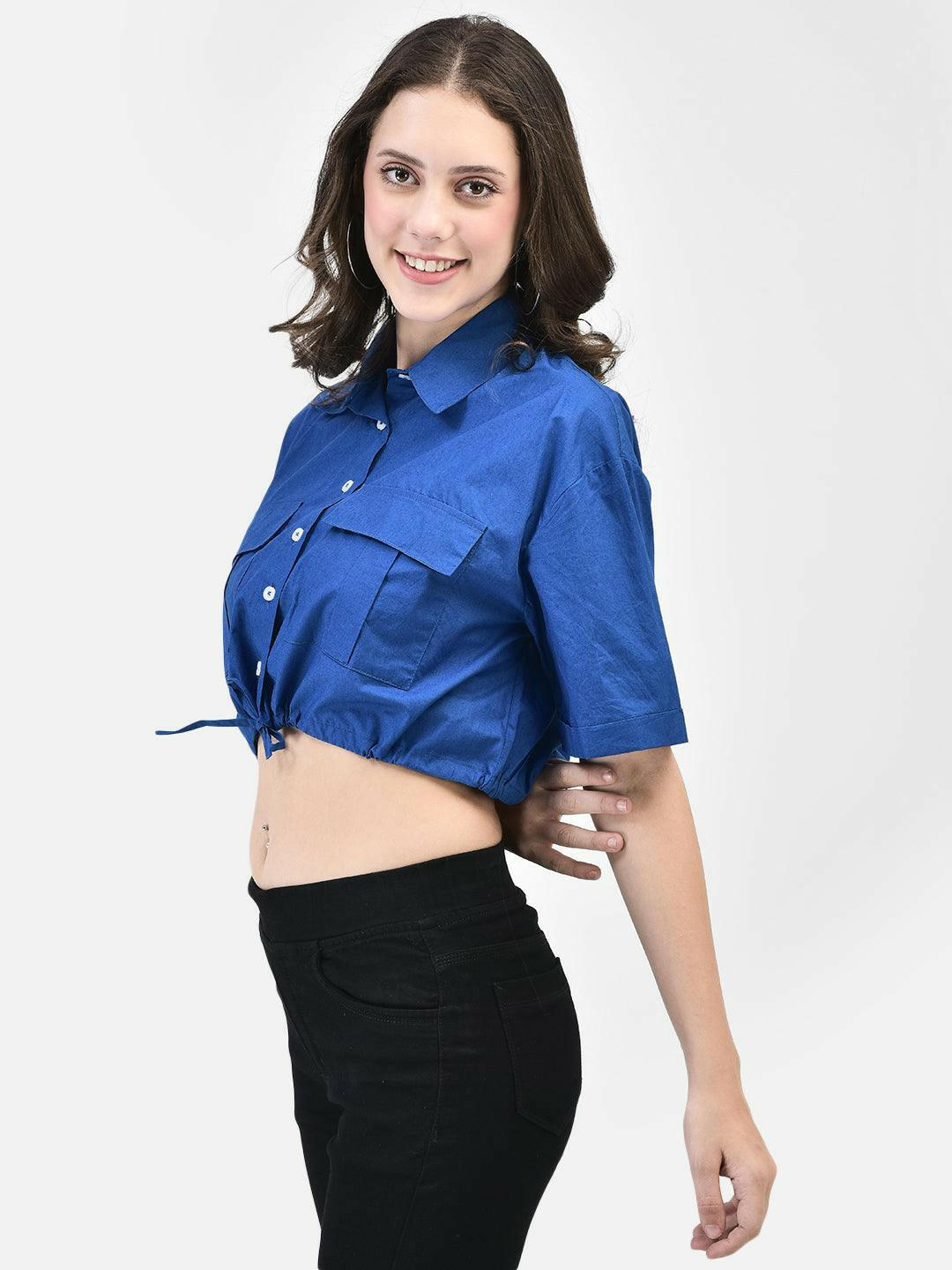 Model wearing a cobalt blue cropped shirt with front pockets, paired with black high-waisted pants and black heels.
Meta Tags:
Cobalt Blue Cropped Shirt with Front Pockets | elvtd. Fashion
Elevate your casual look with this cobalt blue cropped shirt featuring front pockets and a stylish tie-front. Perfect for pairing with high-waisted pants for a chic and modern outfit.
Keywords: cobalt blue cropped shirt, front pocket shirt, women's casual shirt, tie-front shirt, blue fashion top 