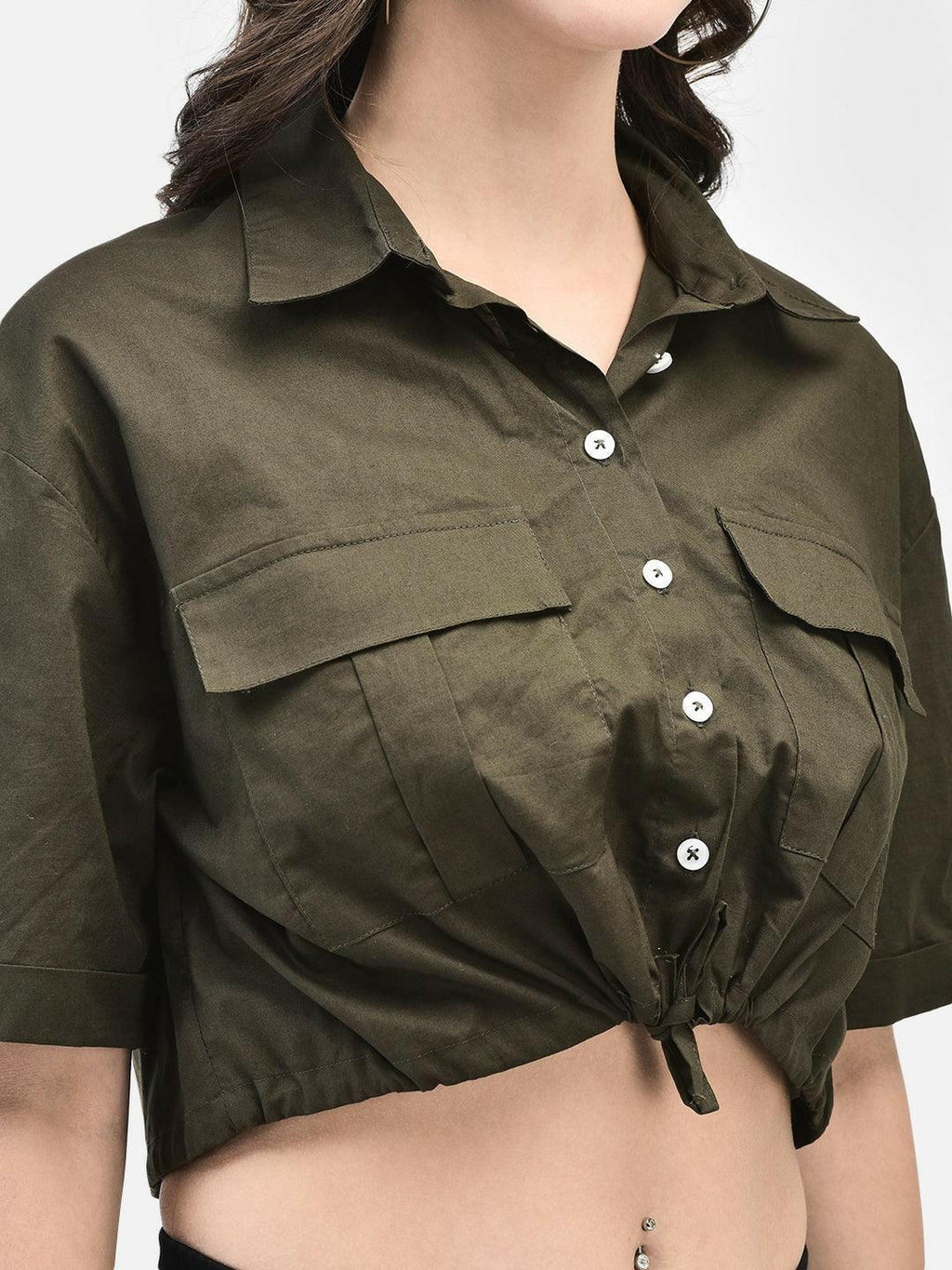 Close-up of shirt’s collar and buttoned chest pockets
