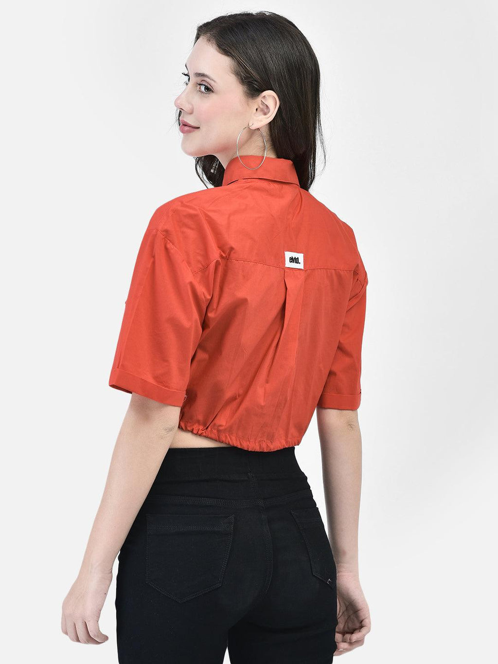Back view of red cropped summer shirt with short sleeves and yoke detail