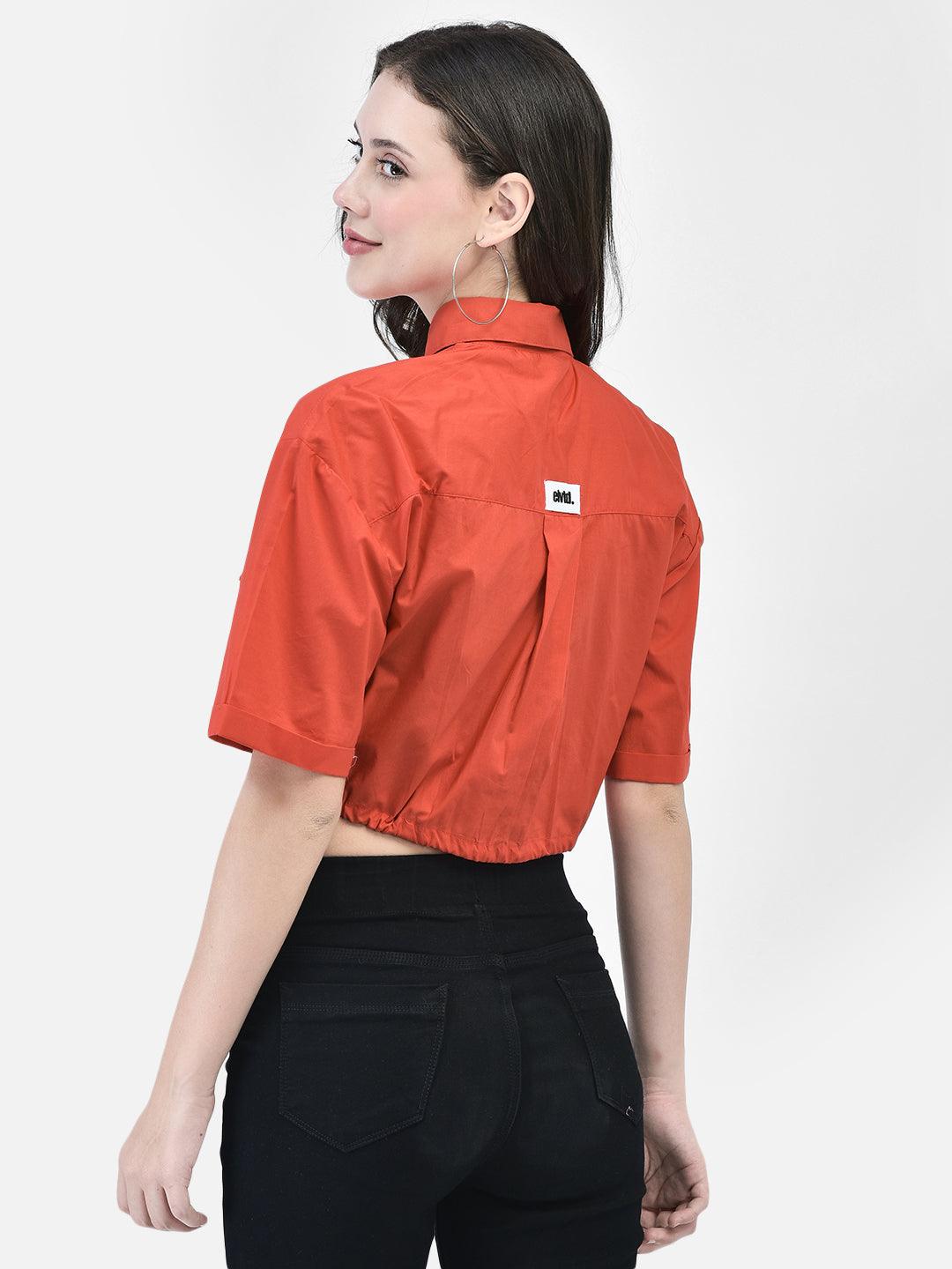 Model wearing a red colored cropped shirt with front pockets, paired with black high-waisted pants and black heels.
Meta Tags:
Red Cropped Shirt with Front Pockets | elvtd. Fashion
Elevate your casual look with this Olive Moss cropped shirt featuring front pockets and a stylish tie-front. Perfect for pairing with high-waisted pants for a chic and modern outfit.
Keywords: Red cropped shirt, front pocket shirt, women's casual shirt, tie-front shirt, Red fashion top 