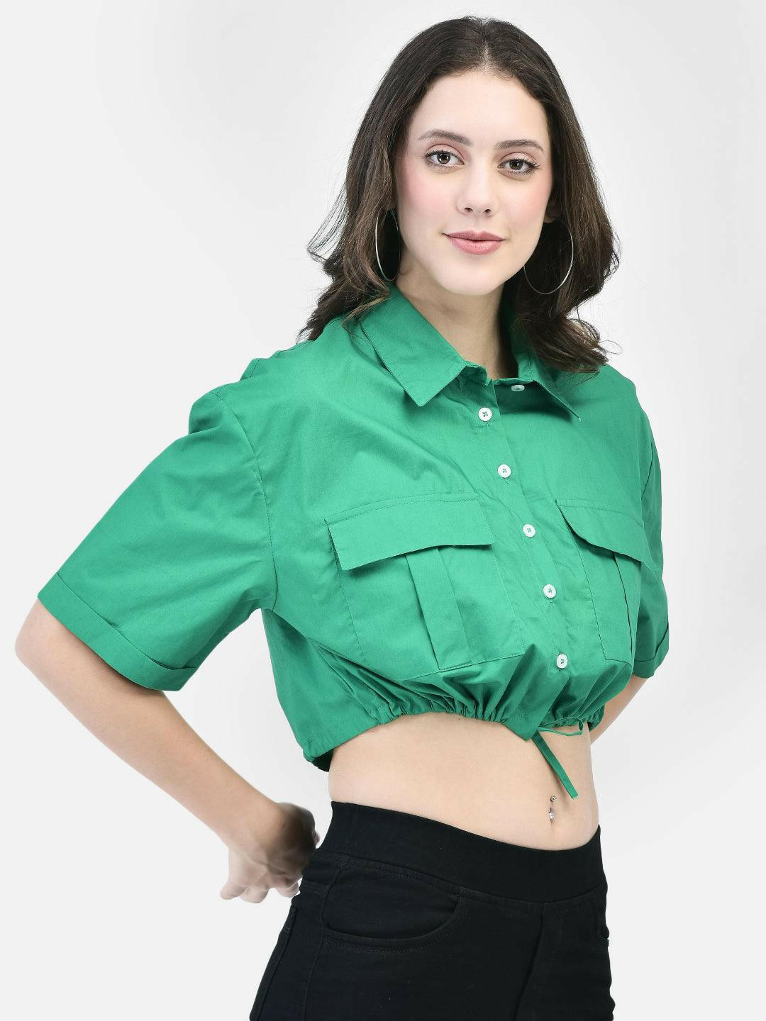 Model wearing a green cropped shirt with front pockets, paired with black high-waisted pants and beige heels.
Meta Tags:
Green Cropped Shirt with Front Pockets | elvtd. Fashion
Elevate your casual look with this green cropped shirt featuring front pockets and a stylish tie-front. Perfect for pairing with high-waisted pants for a chic and modern outfit.
Keywords: Green cropped shirt, front pocket shirt, women's casual shirt, tie-front shirt, green fashion top