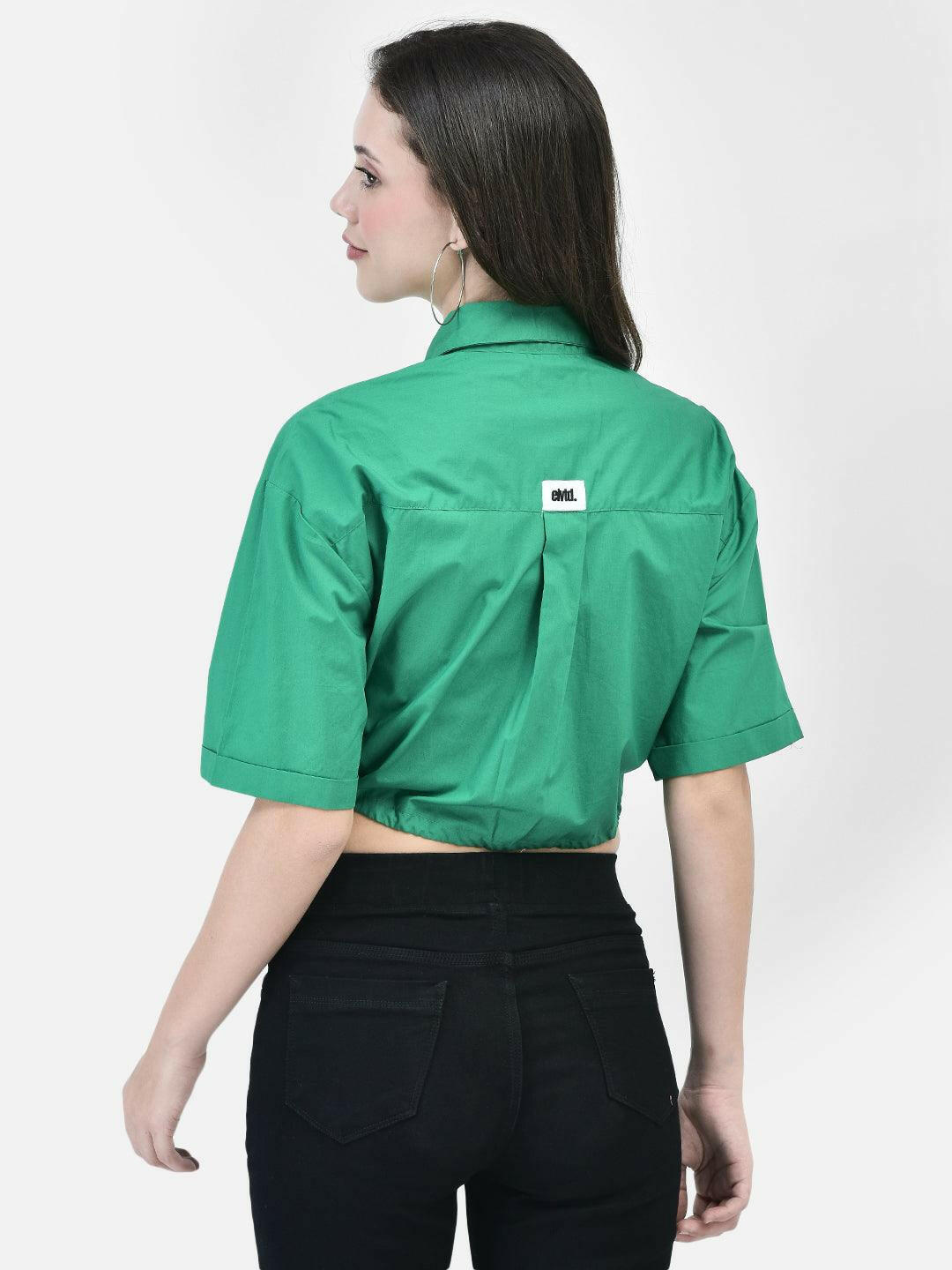 Model wearing a green cropped shirt with front pockets, paired with black high-waisted pants and beige heels.
Meta Tags:
Green Cropped Shirt with Front Pockets | elvtd. Fashion
Elevate your casual look with this green cropped shirt featuring front pockets and a stylish tie-front. Perfect for pairing with high-waisted pants for a chic and modern outfit.
Keywords: Green cropped shirt, front pocket shirt, women's casual shirt, tie-front shirt, green fashion top