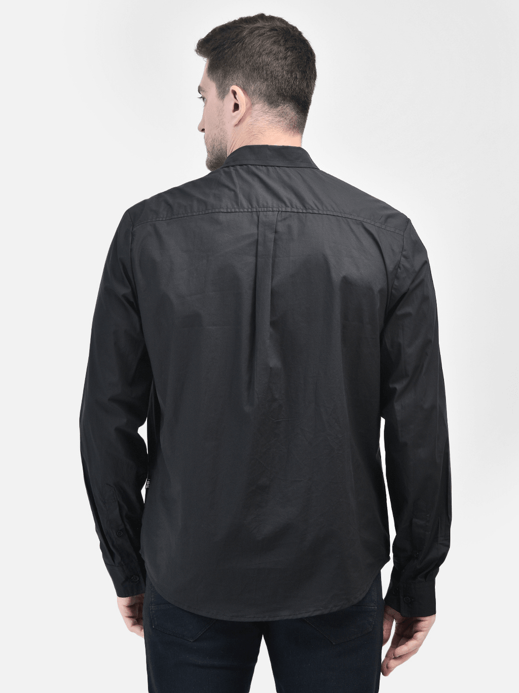 Back view of men’s classic black shirt showing fit and cut