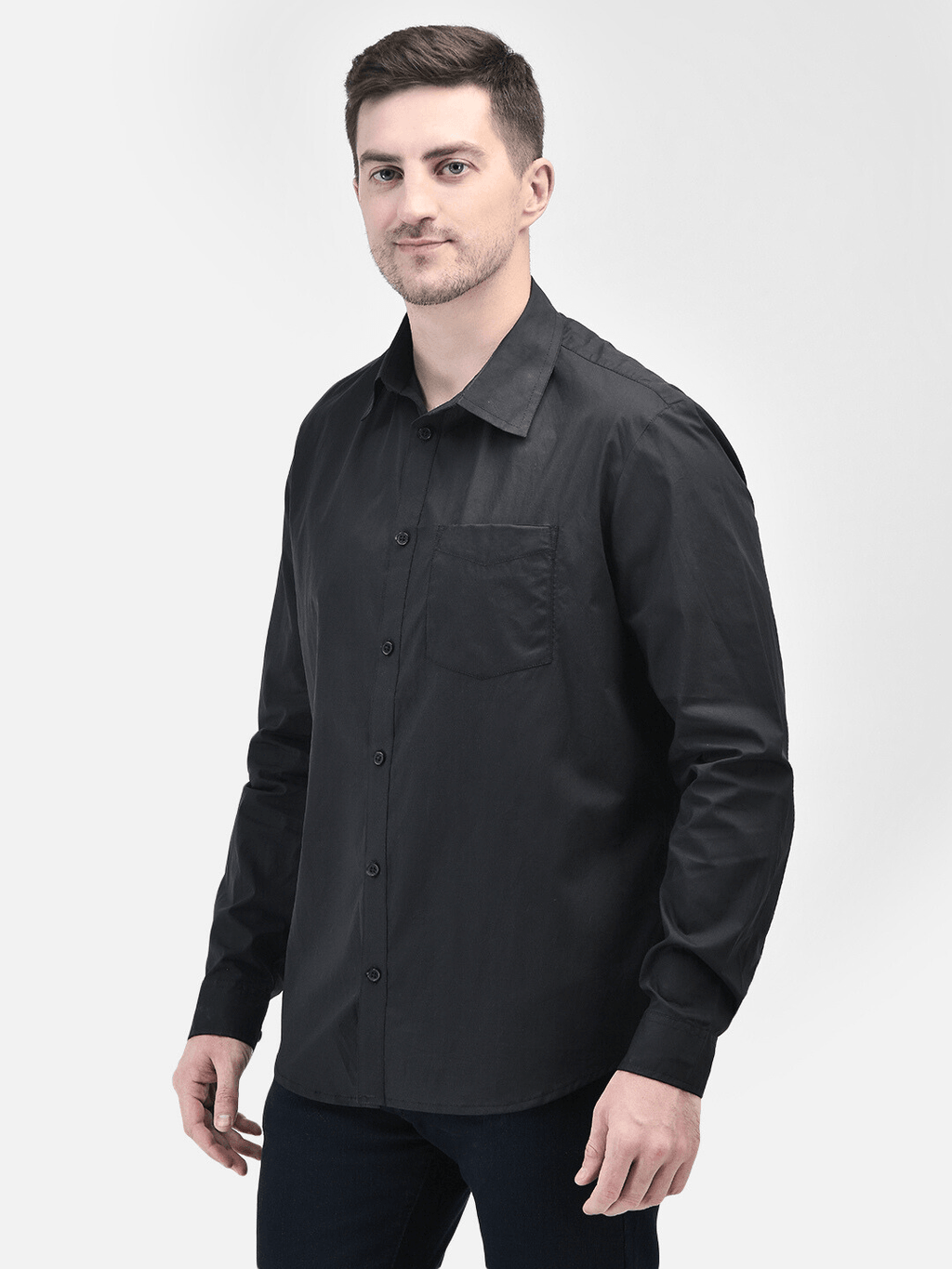 Male model posing in motion wearing black long sleeve shirt for men