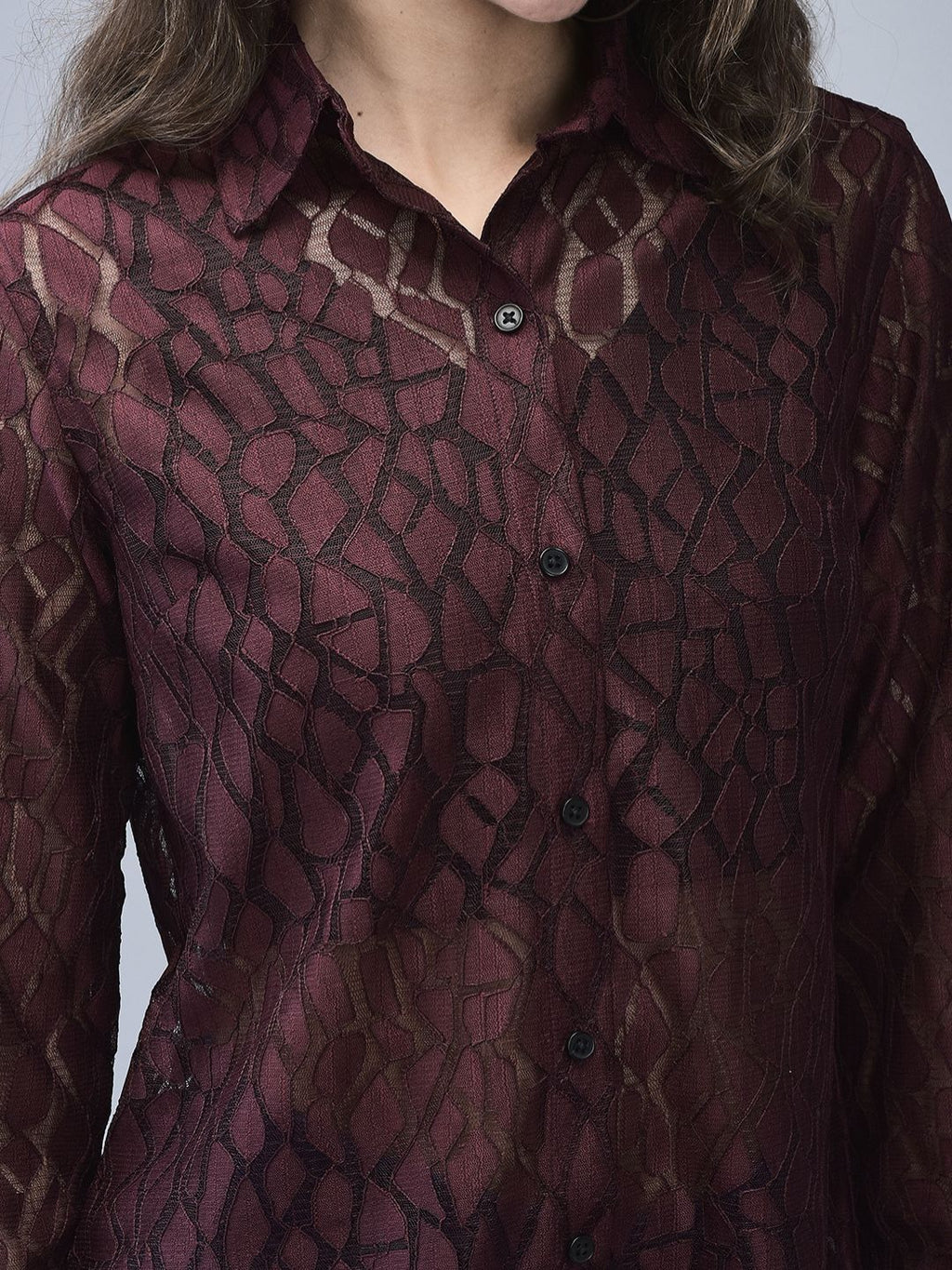 Close-up of wine textured shirt showing crochet pattern and collar